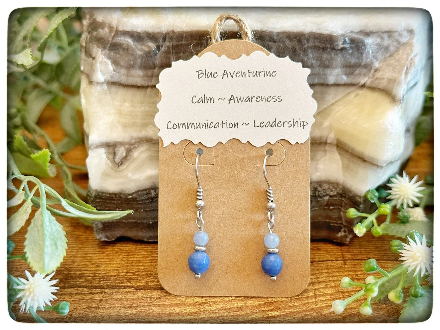 Blue aventurine earrings on a kraft-paper display card